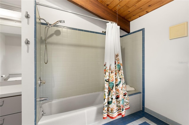 bathroom featuring shower / tub combo with curtain, vanity, wooden ceiling, and tile patterned flooring