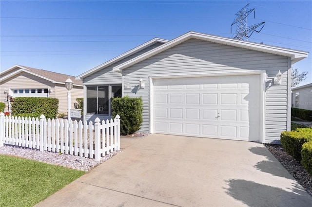 single story home featuring a garage