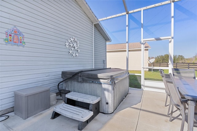 view of patio / terrace featuring a hot tub