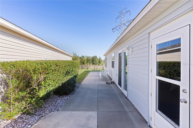 view of home's exterior with a patio