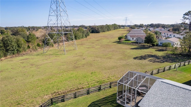 birds eye view of property with a rural view