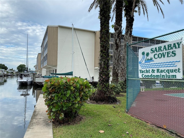 view of building exterior with a water view