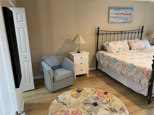 bedroom featuring light hardwood / wood-style floors