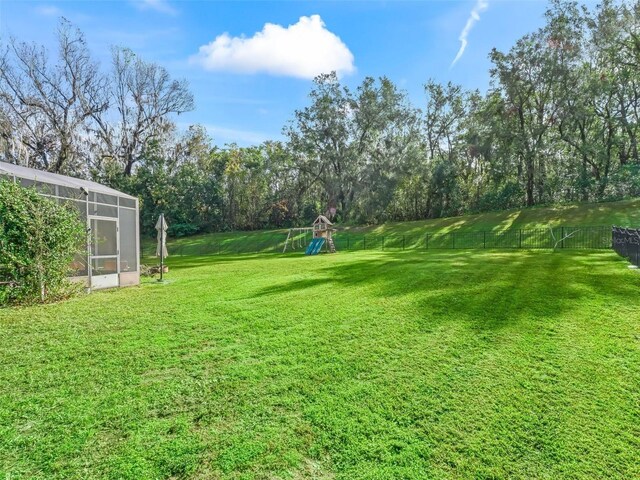 view of yard with a playground