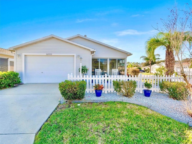 ranch-style house featuring a garage