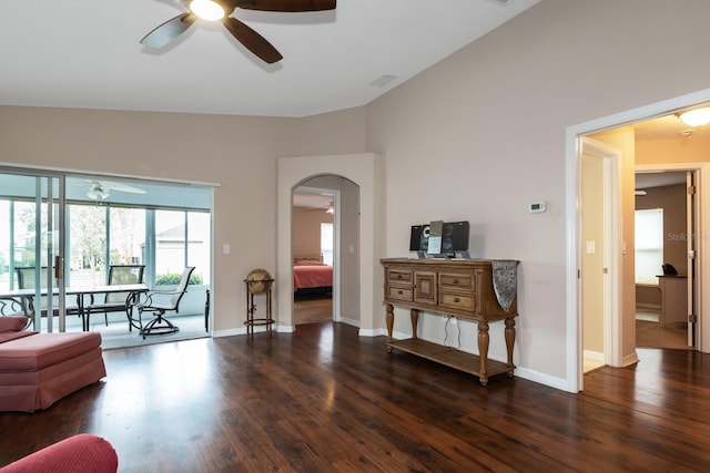 interior space with dark hardwood / wood-style floors and ceiling fan