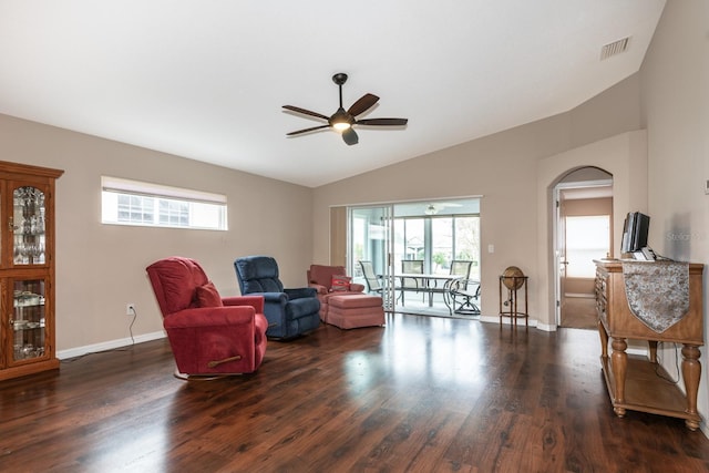 sitting room with vaulted ceiling, ceiling fan, plenty of natural light, and dark hardwood / wood-style floors