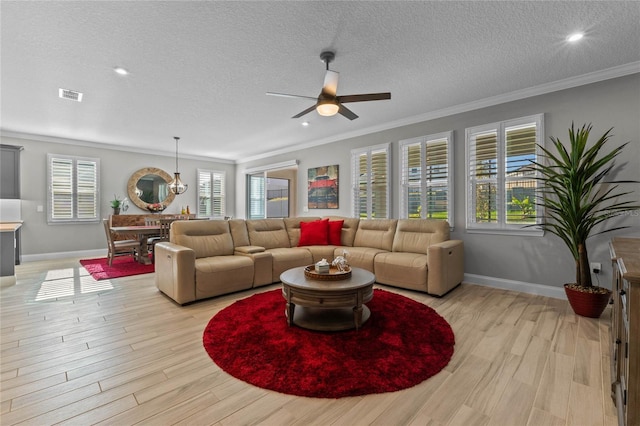 living room featuring light wood-type flooring and a healthy amount of sunlight