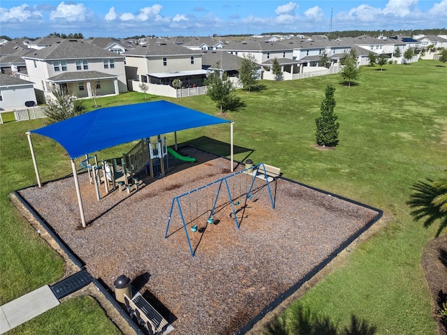 view of playground with a yard