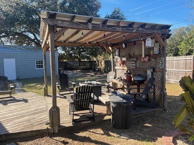 view of patio / terrace featuring a deck and a pergola