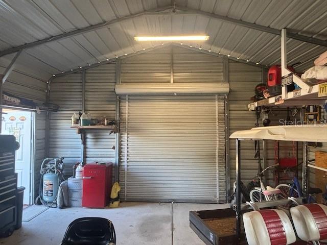 garage featuring a carport