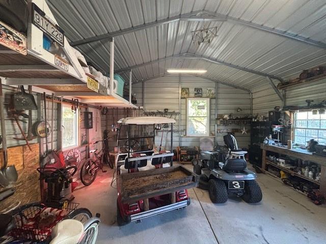 garage with a workshop area