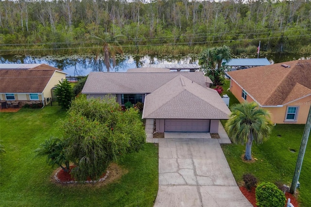 bird's eye view with a water view