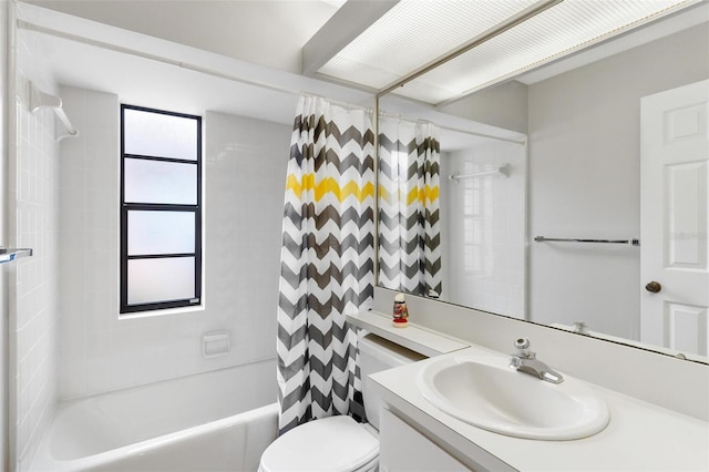 full bathroom featuring shower / bath combination with curtain, toilet, and vanity