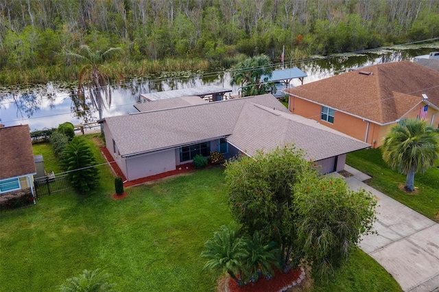 birds eye view of property featuring a water view