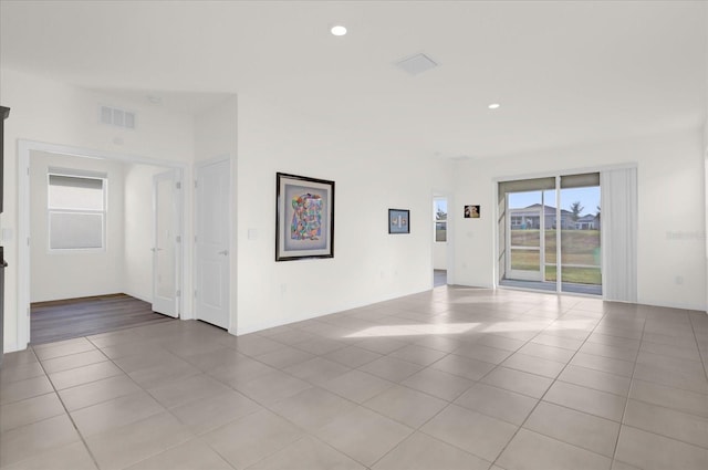 empty room with light tile patterned floors