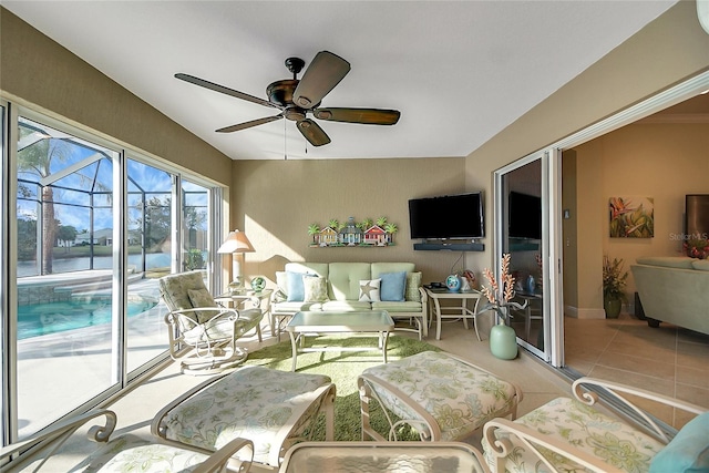 sunroom / solarium with ceiling fan