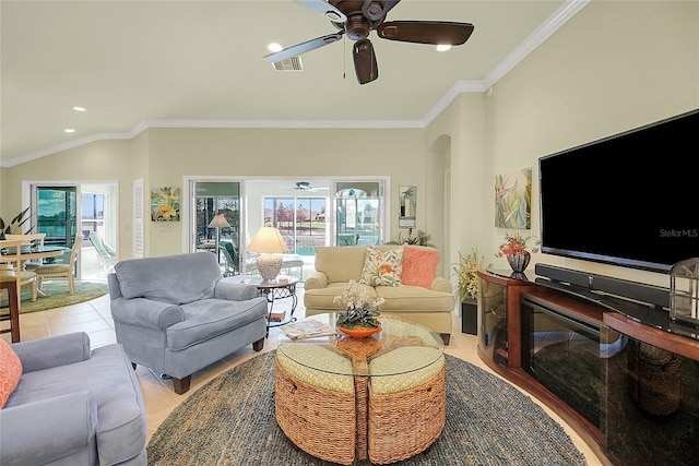 tiled living room with ceiling fan, ornamental molding, and lofted ceiling