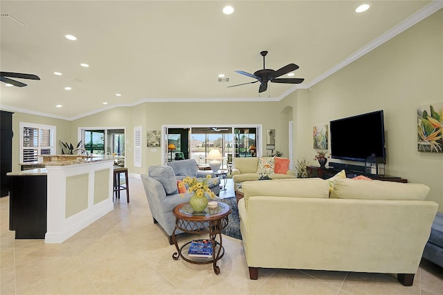 tiled living room with ceiling fan and ornamental molding