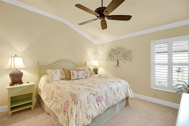 bedroom featuring ceiling fan, crown molding, light carpet, and lofted ceiling