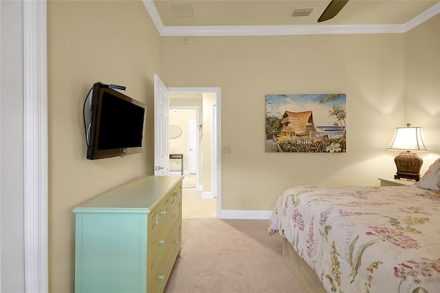 bedroom with ceiling fan, light carpet, and ornamental molding