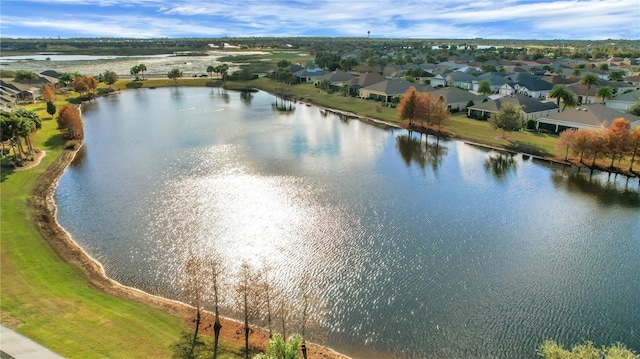 drone / aerial view with a water view