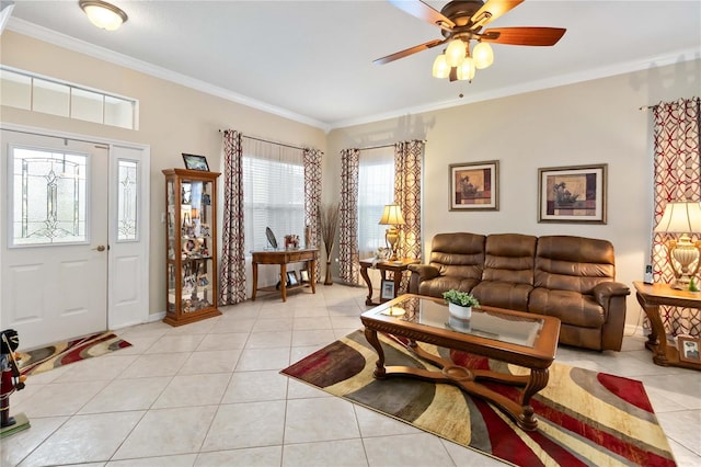 living room with crown molding, light tile patterned floors, and ceiling fan