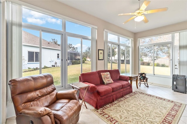 sunroom with plenty of natural light and ceiling fan