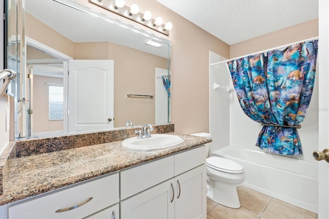 full bathroom featuring vanity, tile patterned flooring, toilet, shower / bathtub combination with curtain, and a textured ceiling