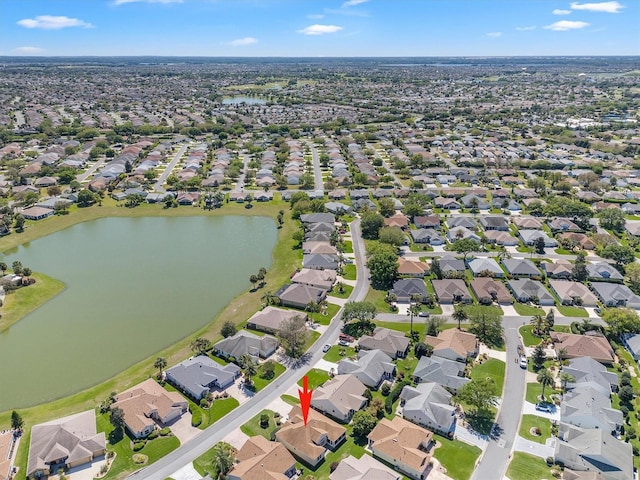 drone / aerial view featuring a water view