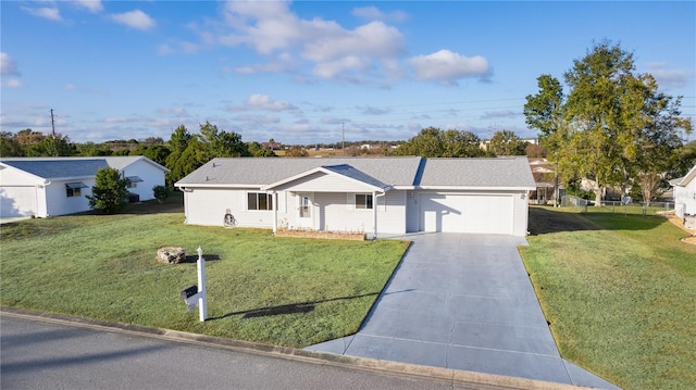 ranch-style house with a front lawn and a garage