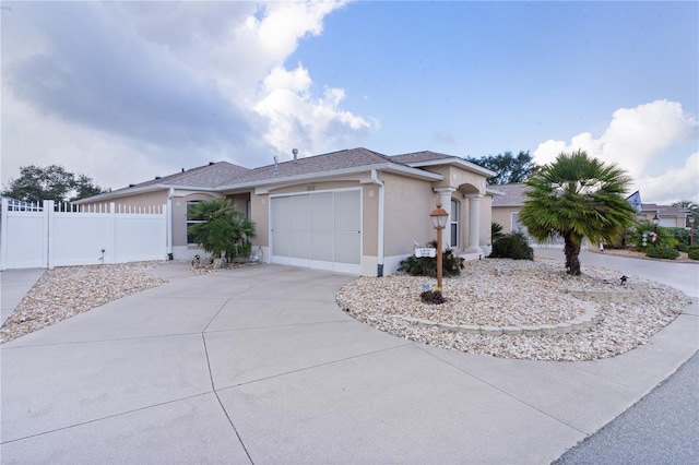 ranch-style home with a garage