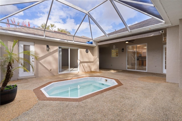 view of pool featuring a hot tub and ceiling fan