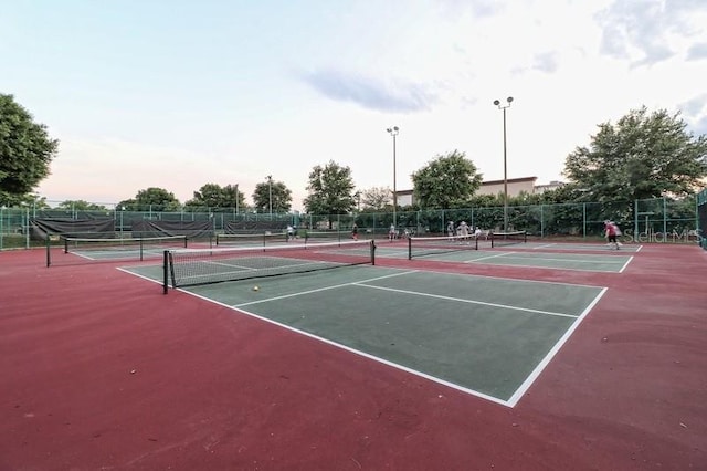 view of tennis court with basketball court