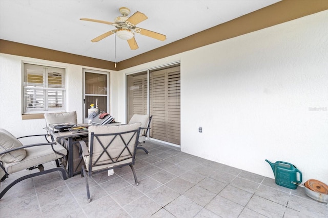 view of patio with ceiling fan