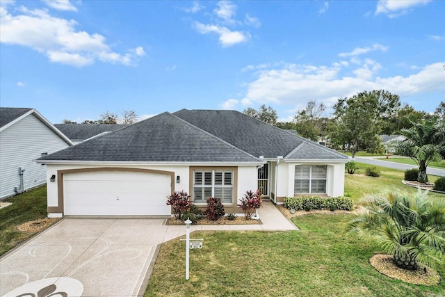 single story home featuring a garage and a front yard