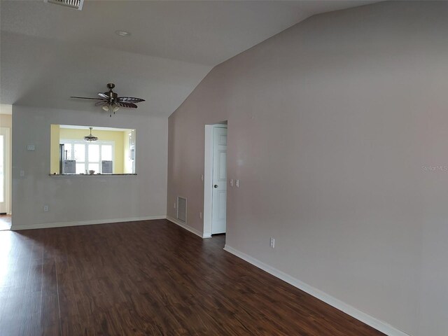603 San Pedro Dr, The Villages, FL 32159 - unfurnished living room with lofted ceiling, a ceiling fan, dark wood-type flooring, and baseboards