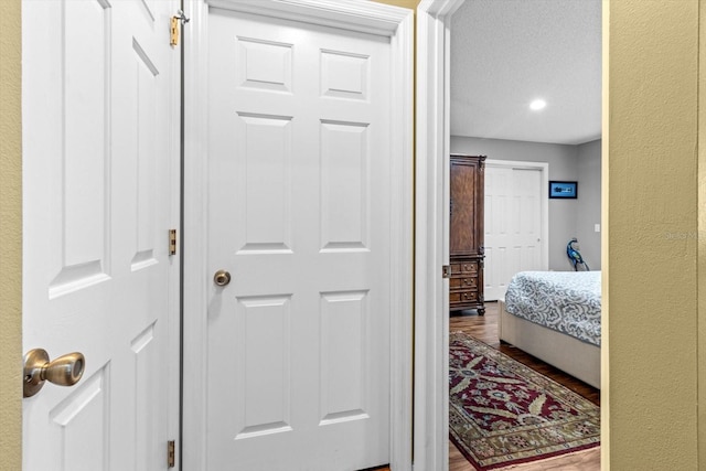 603 San Pedro Dr, The Villages, FL 32159 - hall with dark wood-style floors and recessed lighting