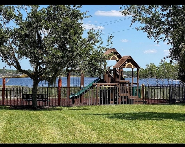 community playground with fence and a yard