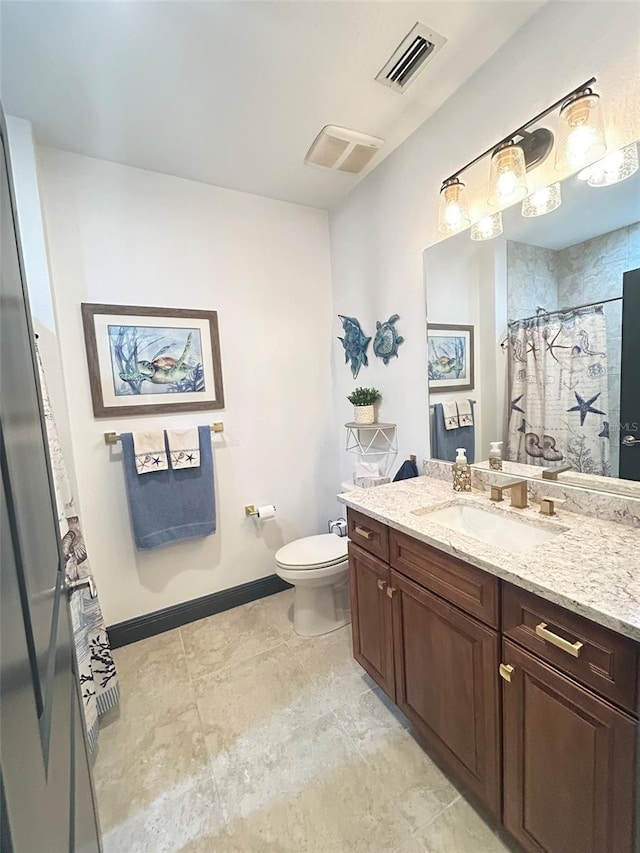 full bathroom with visible vents, toilet, vanity, and baseboards