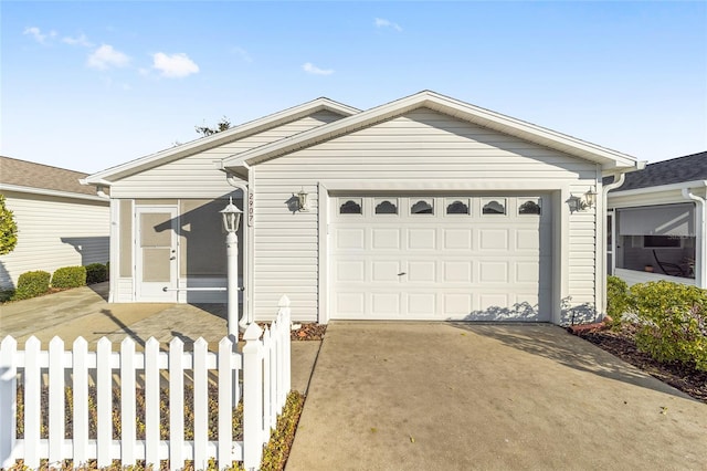 single story home featuring a garage