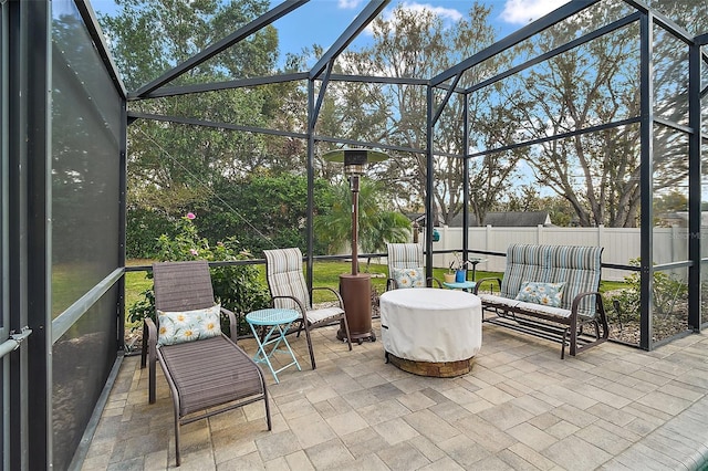 view of patio / terrace with glass enclosure