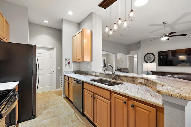 kitchen with tasteful backsplash, light stone counters, stainless steel appliances, ceiling fan, and sink