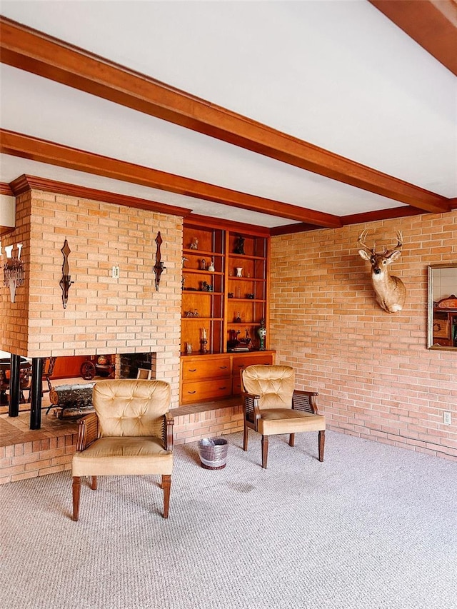 carpeted living room featuring beam ceiling