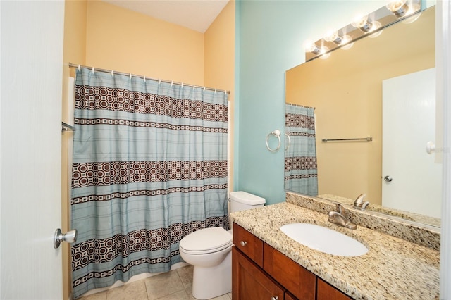 bathroom with curtained shower, toilet, tile patterned floors, and vanity