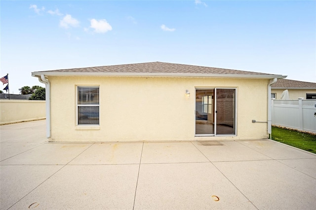 back of property featuring a patio area