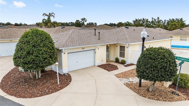 single story home featuring a garage