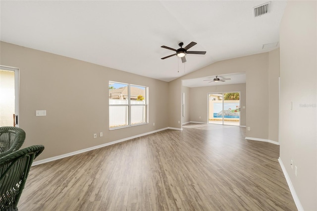 17159 SE 78th Crowfield Ave, The Villages, FL 32162 - unfurnished living room featuring a wealth of natural light, visible vents, a ceiling fan, and wood finished floors