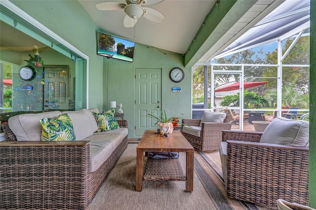 sunroom / solarium with vaulted ceiling and ceiling fan