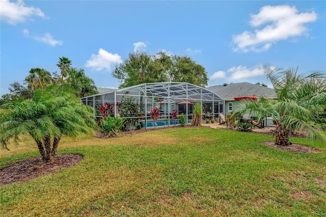 view of yard featuring a lanai